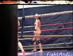 Dyke babes wrestle naked in a boxing ring